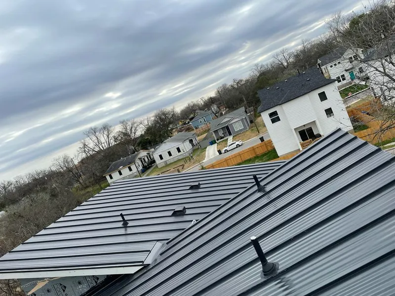 Standing seam metal roof panels with vents for Skylight Repair in Kankakee
